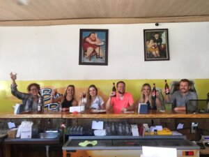 Students drink beer at El botecito in Heredia Costa Rica