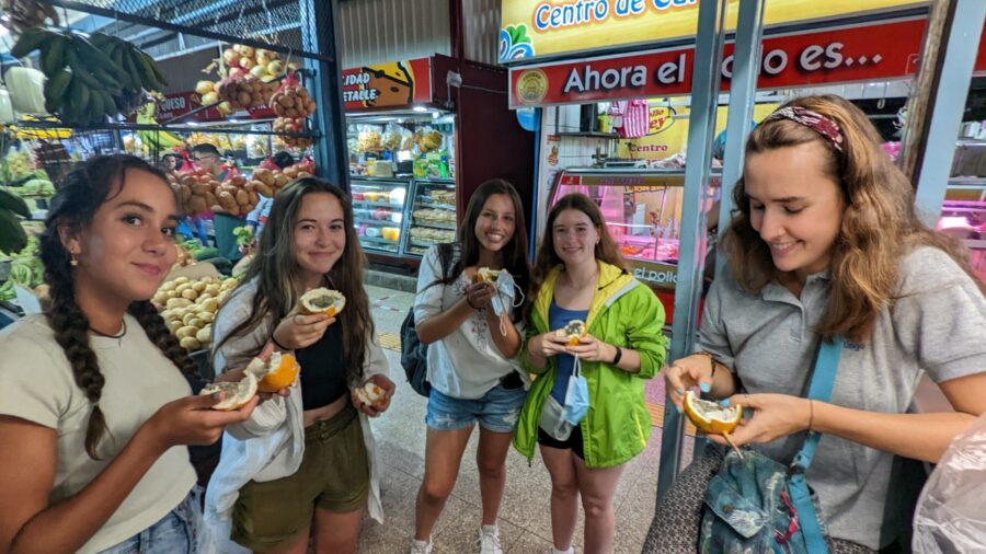 Spanish summer camp students try their first granadilla with Tico Lingo Spanish School